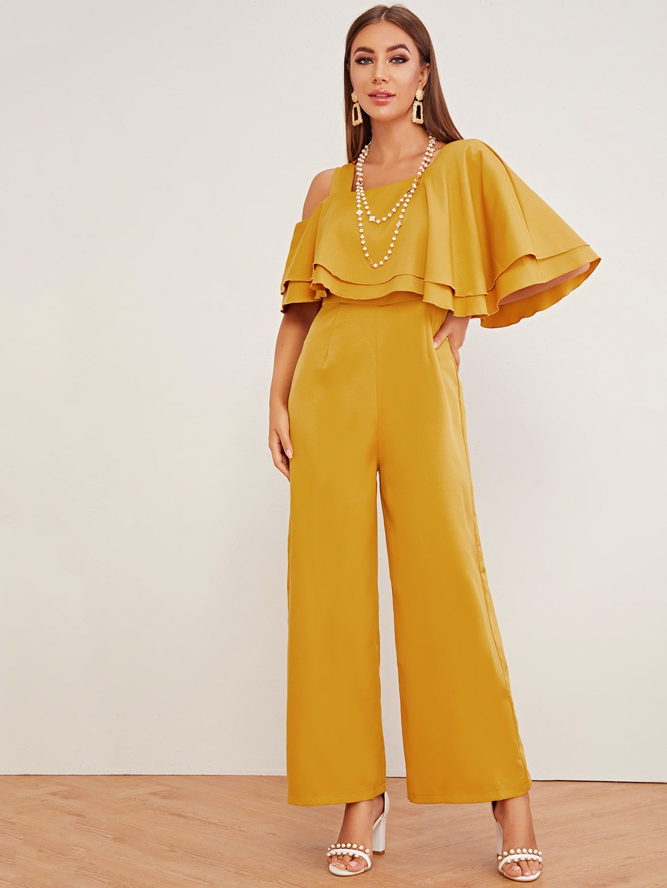 Layered Ruffle Trim Asymmetrical Cold Shoulder Jumpsuit